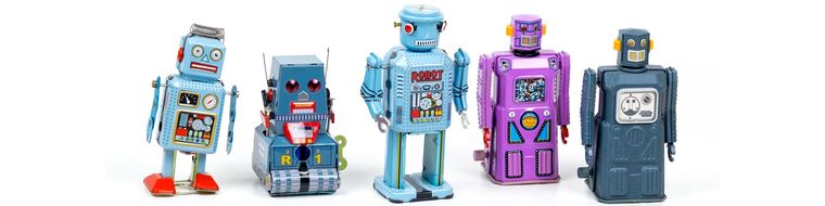 A row of colorful vintage toy robots